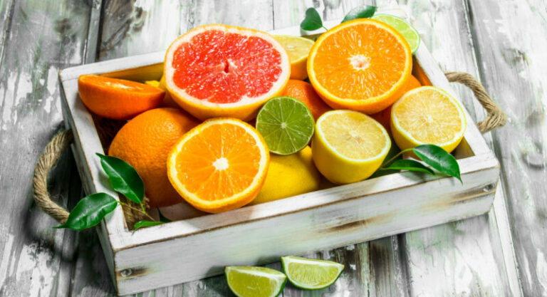 Fresh citrus in tray.